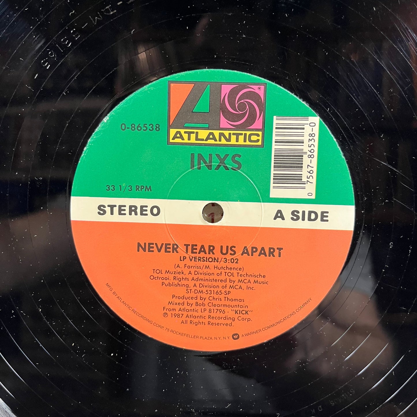 Never Tear Us Apart (VINYL) | Very Good Plus (VG+) Near Mint (NM) Get Cheap Vinyl