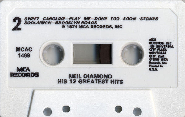 His 12 Greatest Hits (CASSETTE) | Mint (M) Mint (M) Get Cheap Vinyl