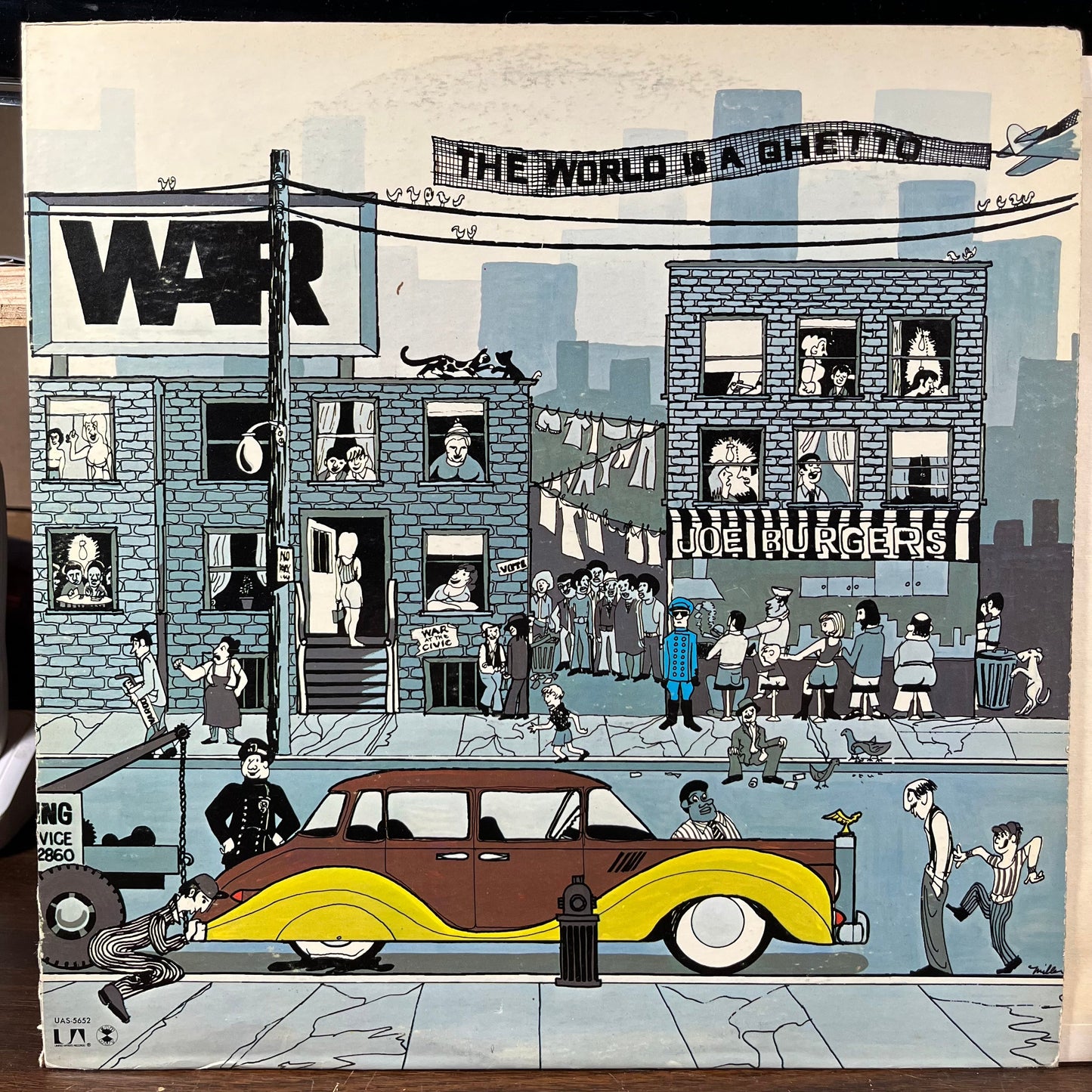 The World Is A Ghetto (VINYL) | Excellent (EX) Excellent (EX) Get Cheap Vinyl