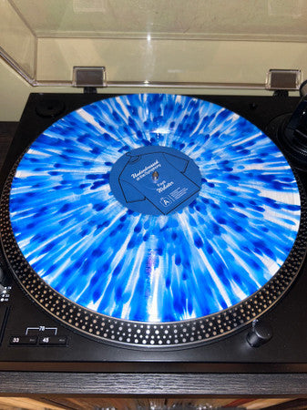 Underdressed At The Symphony (BLUE SPLATTER VINYL) | Mint (M) Mint (M) Get Cheap Vinyl