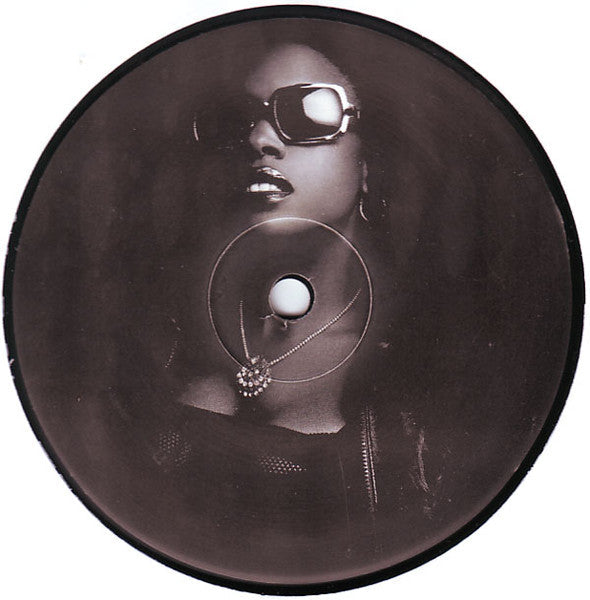 Free (Remixes) | Very Good Plus (VG+) Very Good Plus (VG+) Get Cheap Vinyl
