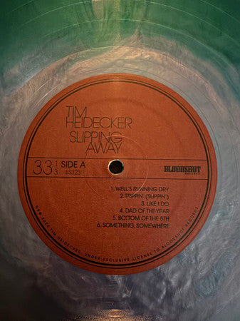 Slipping Away (TRANSLUCENT BLUE WAVE VINYL) | Mint (M) Mint (M) Get Cheap Vinyl