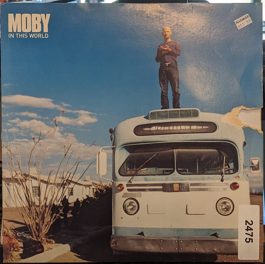 In This World | Near Mint (NM) Very Good (VG) Get Cheap Vinyl