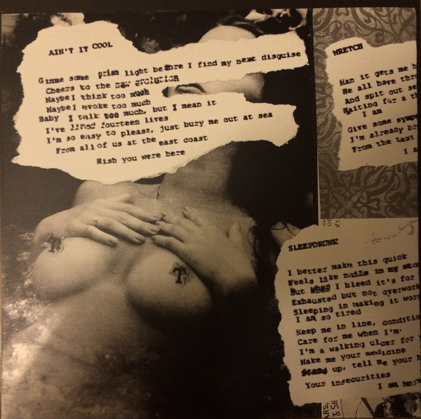 Feral King (HALF CLEAR / HALF BLACK VINYL 7") | Mint (M) Mint (M) Get Cheap Vinyl