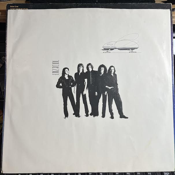 Escape (VINYL) | Very Good Plus (VG+) Very Good Plus (VG+) Get Cheap Vinyl