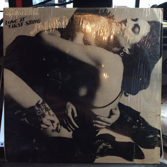 Love At First Sting (VINYL) | Very Good Plus (VG+) Excellent+ (EX+) Get Cheap Vinyl