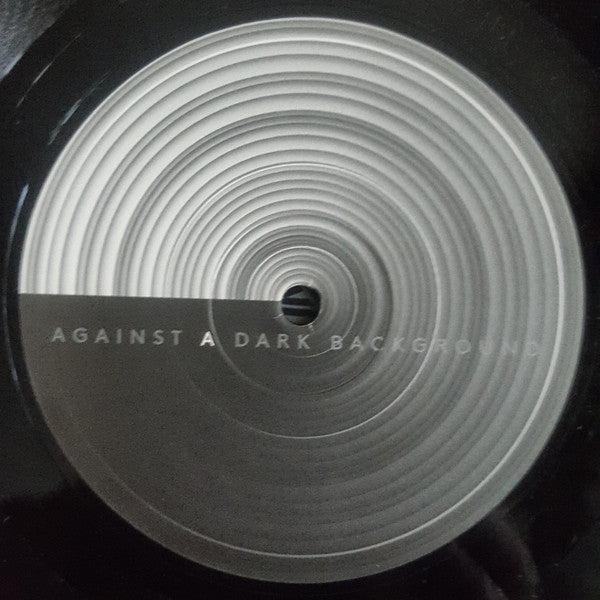 Against A Dark Background | Mint (M) Mint (M) Get Cheap Vinyl
