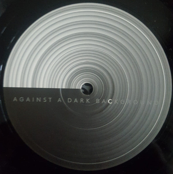 Against A Dark Background | Mint (M) Mint (M) Get Cheap Vinyl