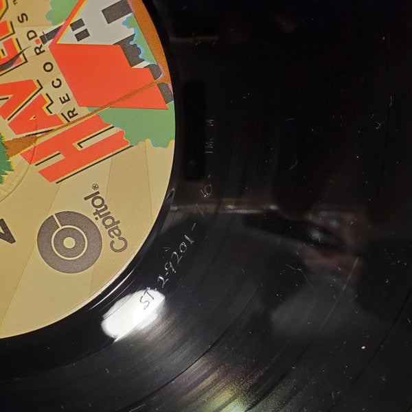 Give It To The People | Near Mint (NM) Near Mint (NM) Get Cheap Vinyl