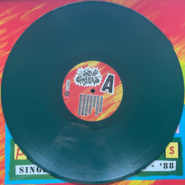 Raw TV Products: Singles & Rarities 1985 - 88 (IEX | GREEN VINYL) | Mint (M) Mint (M) Get Cheap Vinyl
